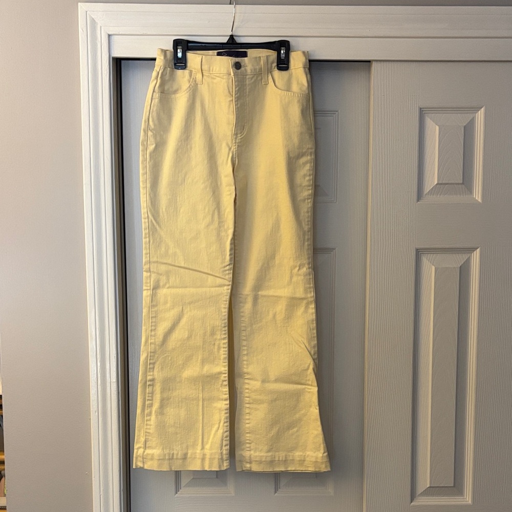 NYDJ mellow yellow jeans with a flare bottom.